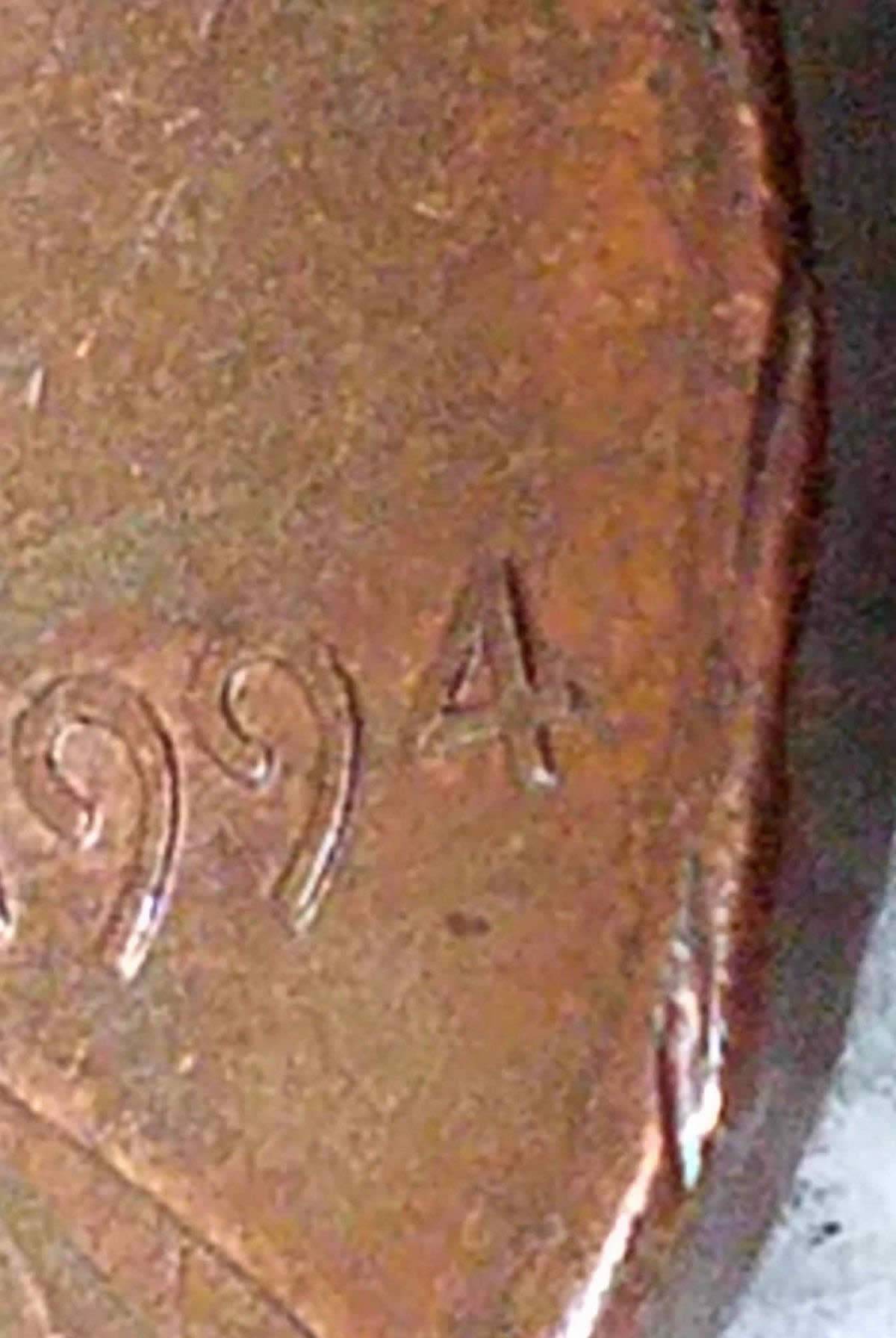1994-P-Lincoln-Indentations-Prior-To-A-Clipped-Planchet?